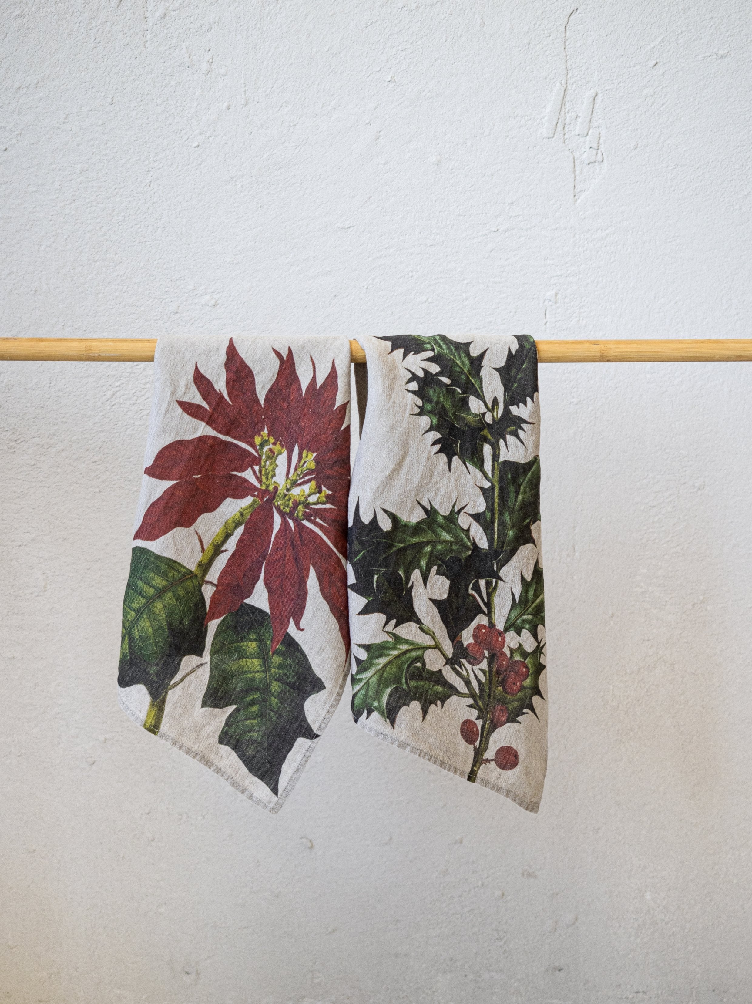 Linoroom “Holly & Poinsettia,” Pair of linen printed tea towels.