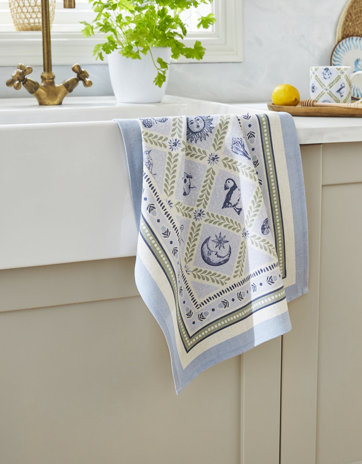 Ulster Weavers, "Coastal Treasures", Printed textured cotton tea towel. - Home Landing