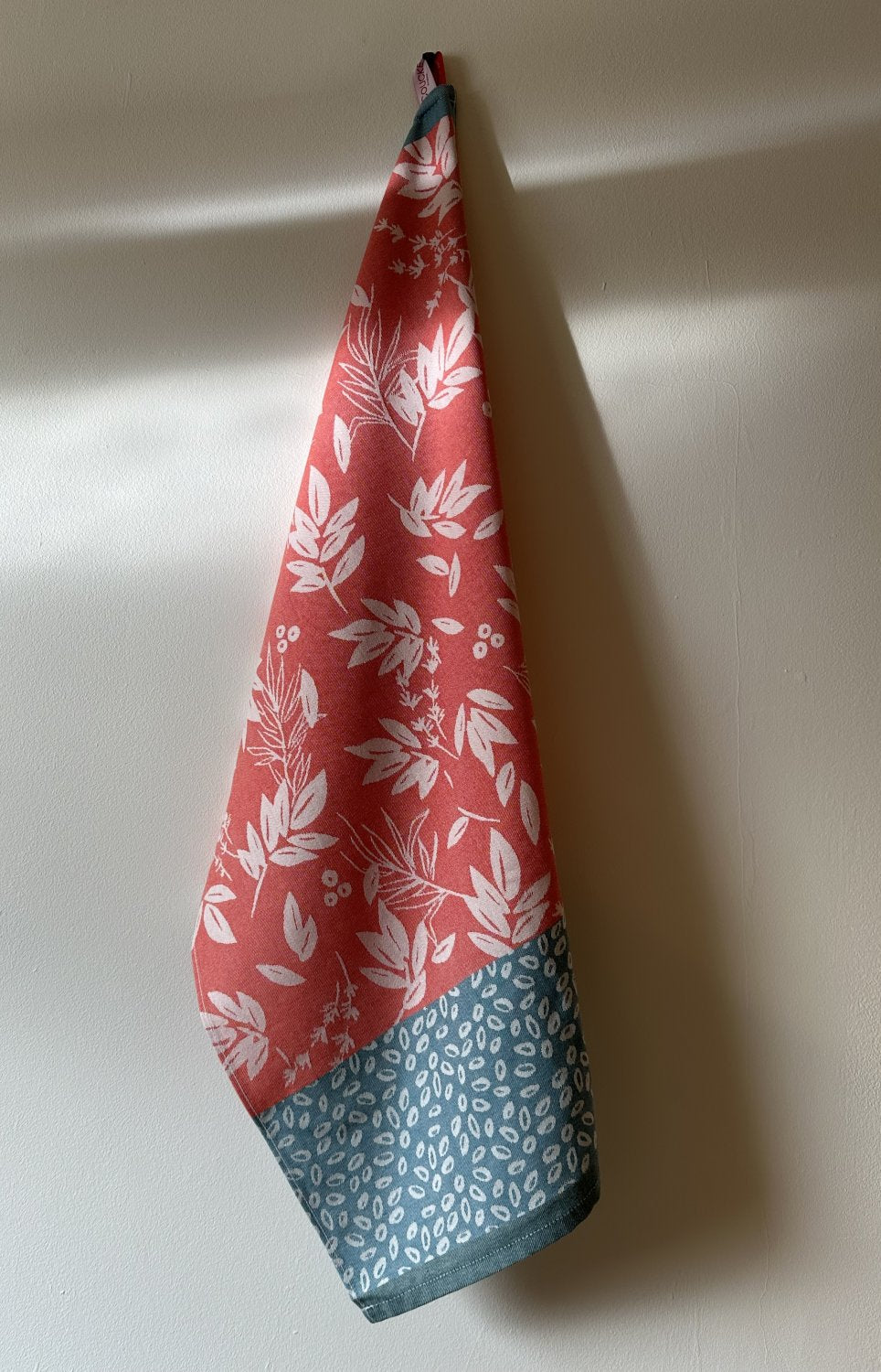 Coucke “Feuillage - Rouge", Woven cotton tea towel. Designed in France.