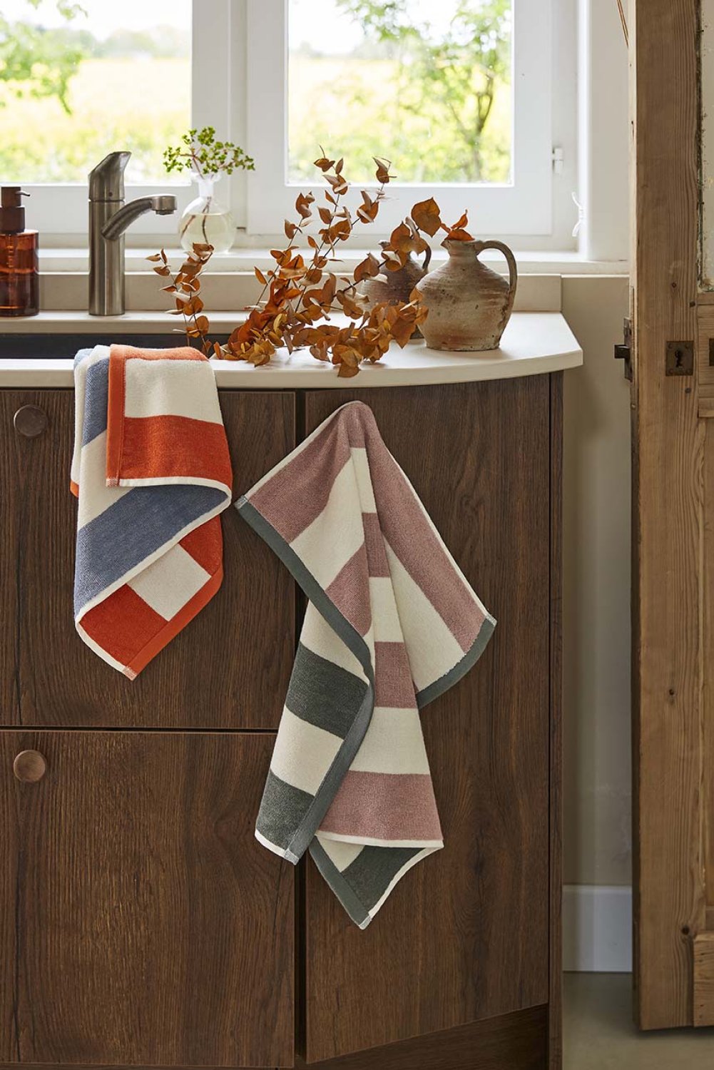 Coucke "Rivage-Orange & Blue", Cotton terry hand towel. Designed in France.