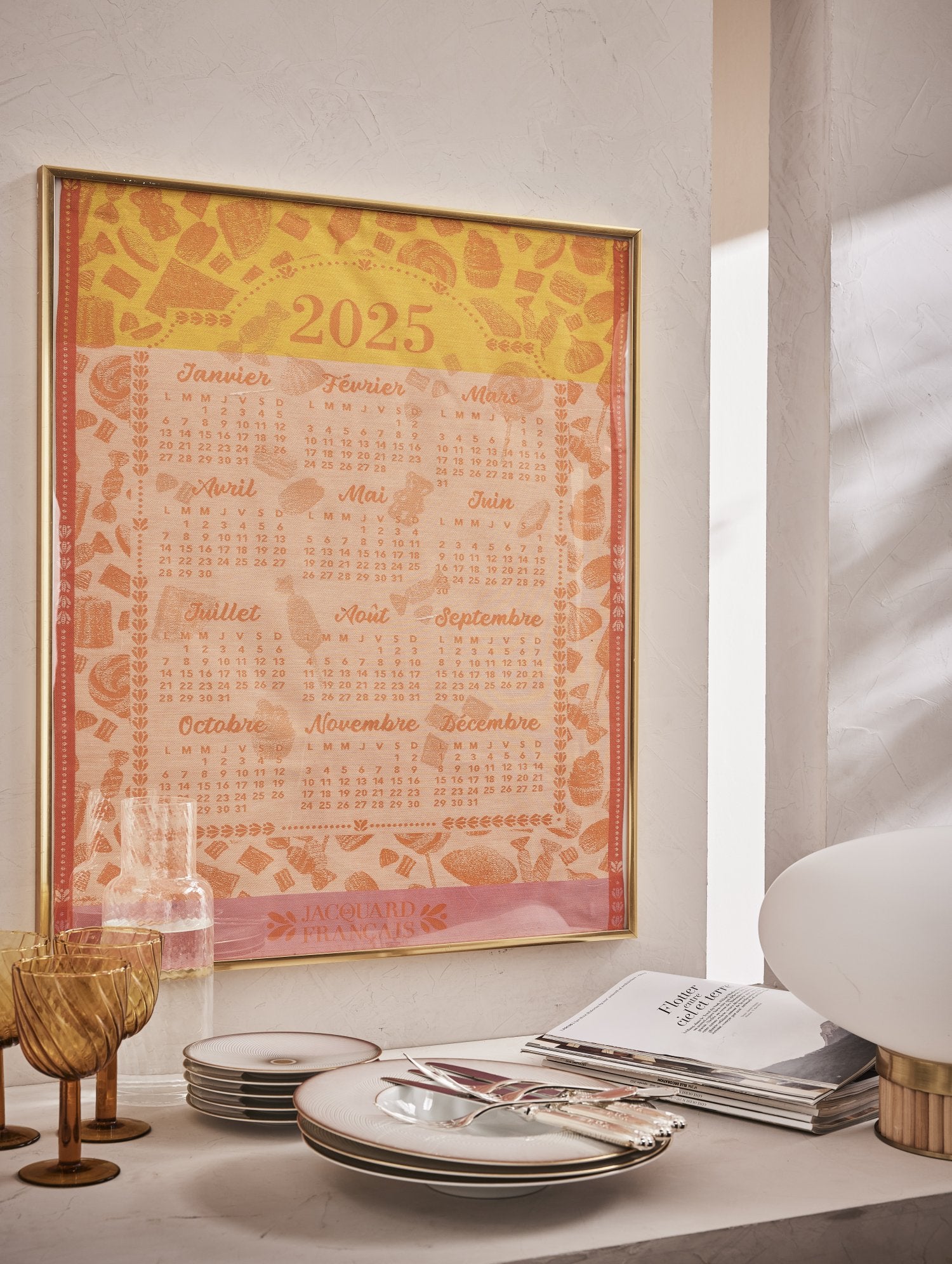 Jacquard Francais "Calendrier Gormandises 2025" (Orange), Woven cotton tea towel. Made in France.