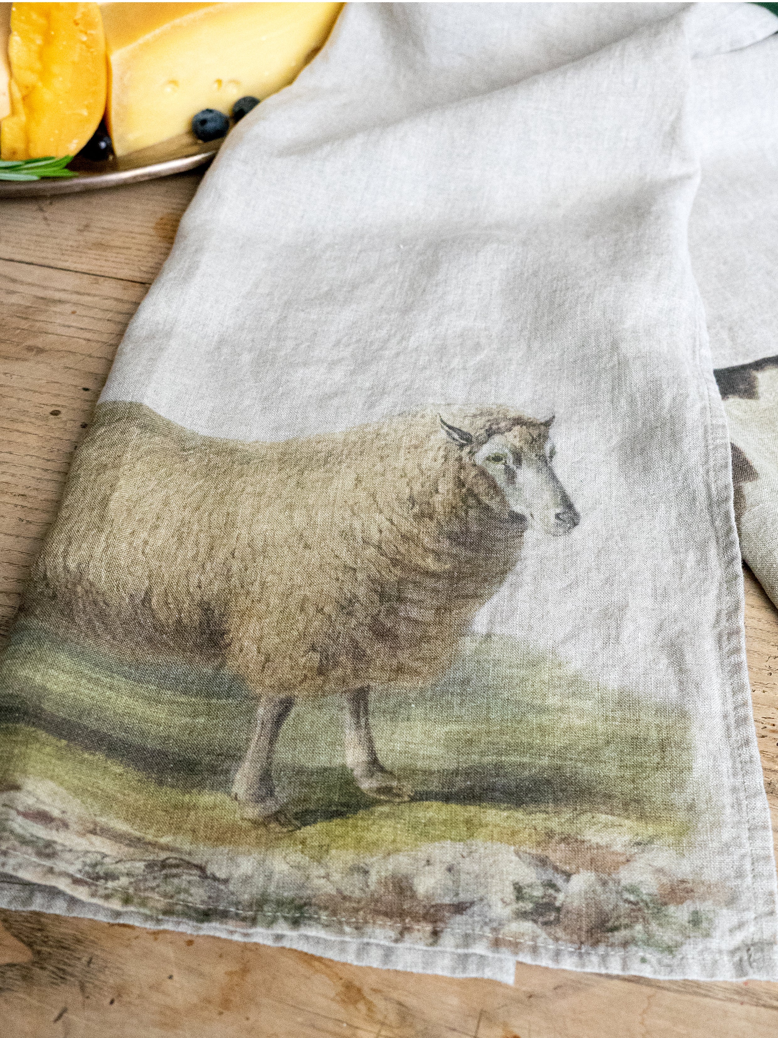 The Linoroom “Sheep & Cow,” Pair of linen printed tea towels.