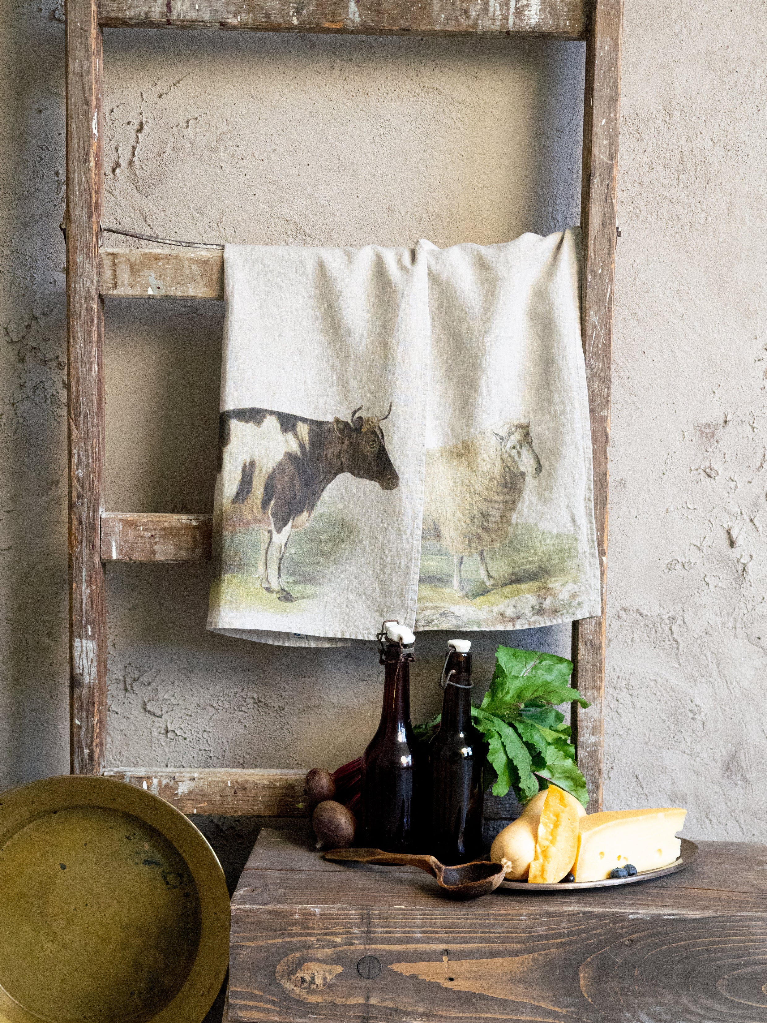 The Linoroom “Sheep & Cow,” Pair of linen printed tea towels.