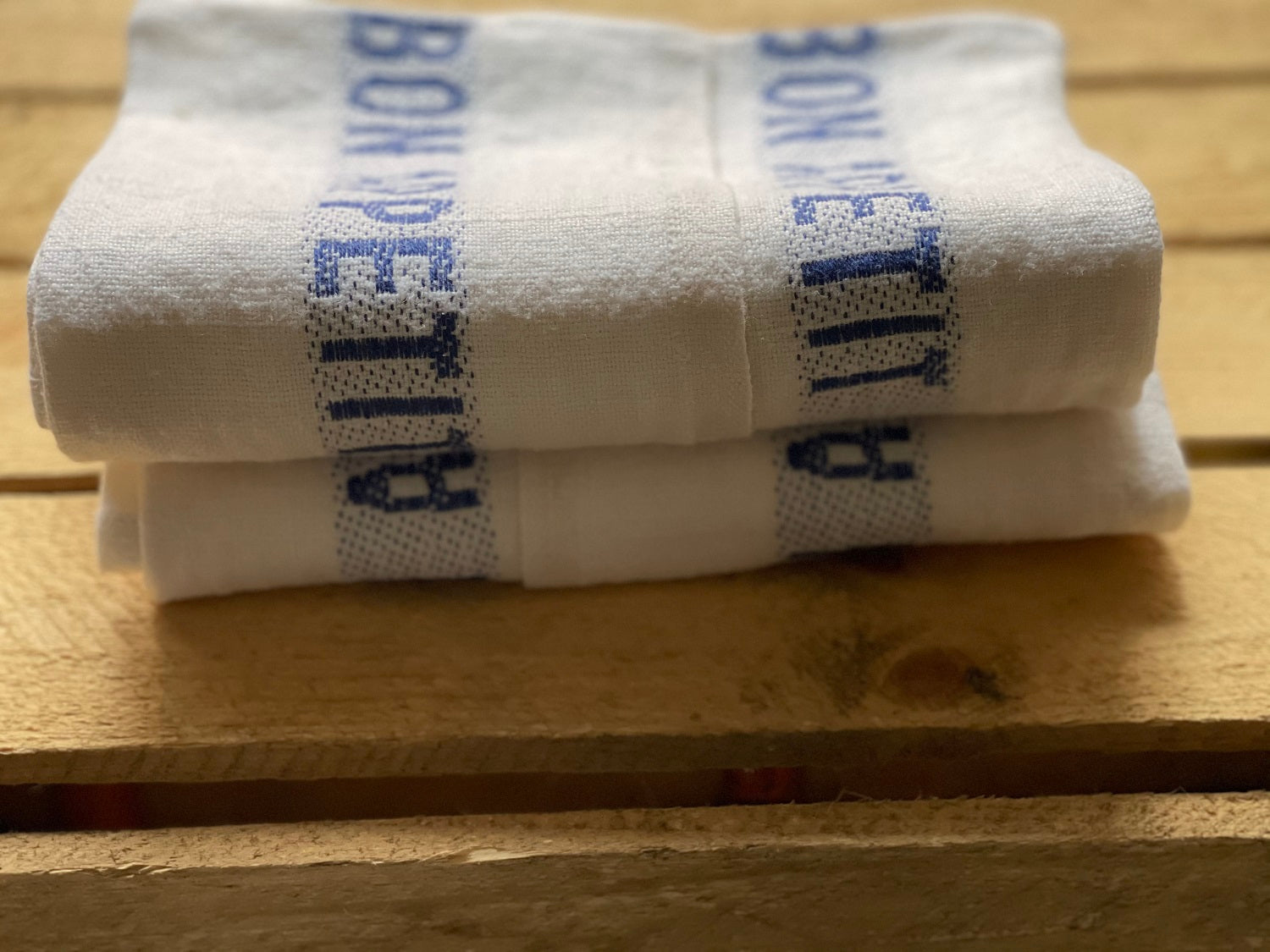 Charvet Editions "Bon Appetit" (Blue), White woven linen tea towel. Made in France.