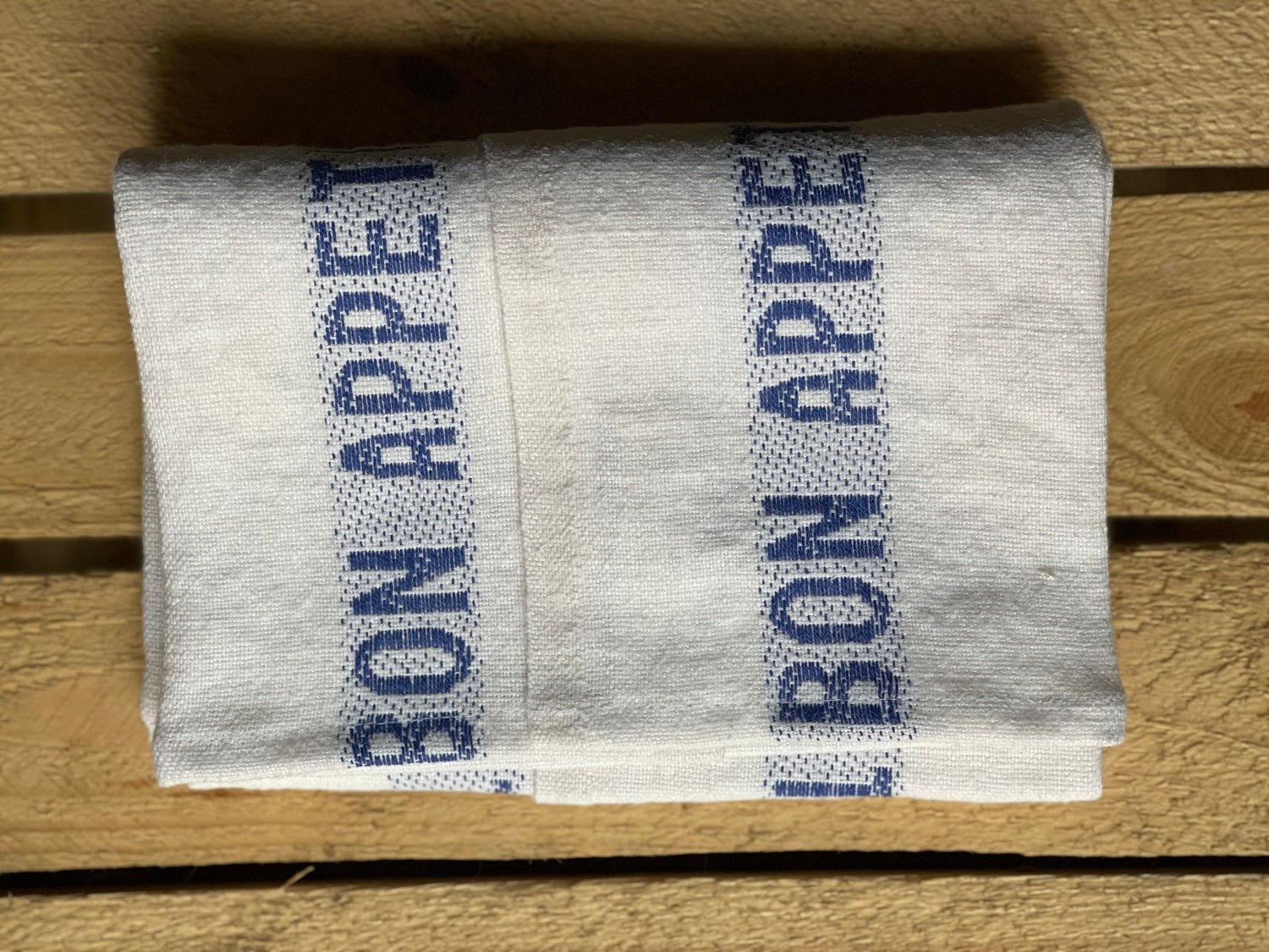 Charvet Editions "Bon Appetit" (Blue), White woven linen tea towel. Made in France.